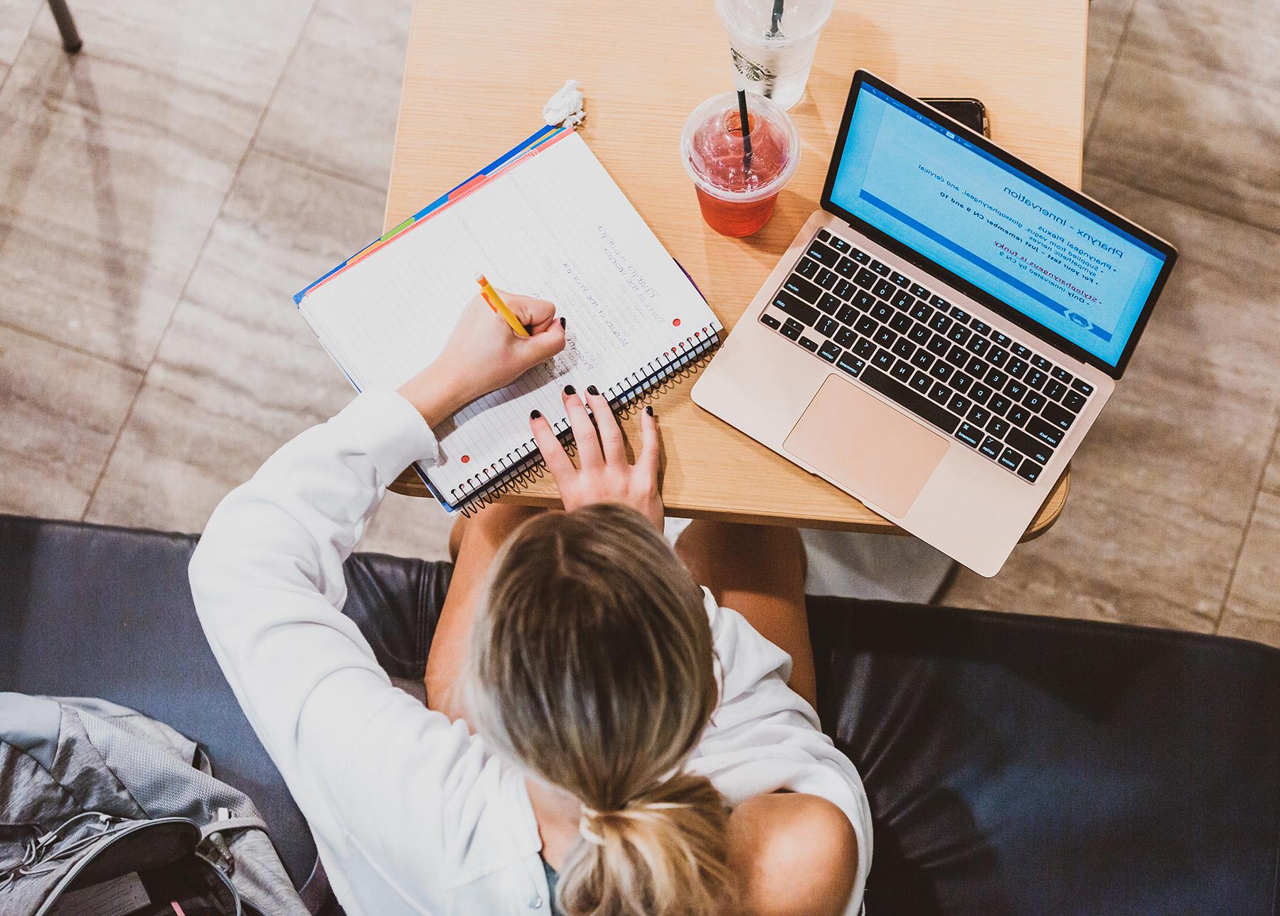 girl studying at a table